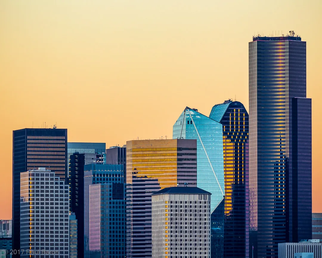 A photograph titled Sunrise Scrapers